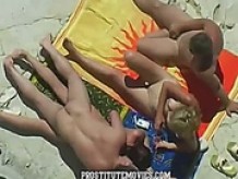 Brutal wife swapping on the beach